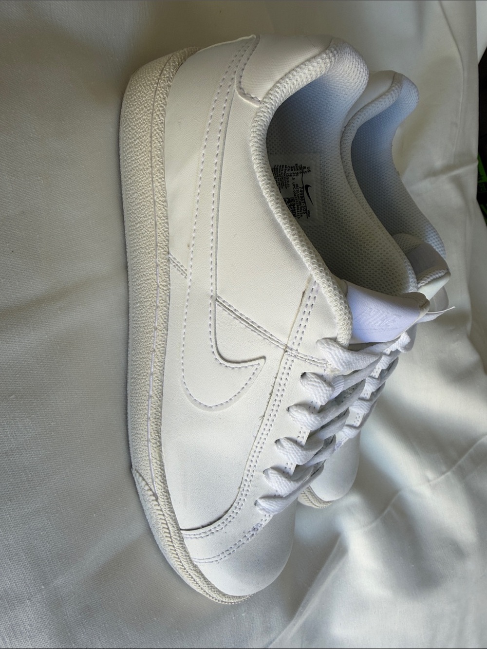 Nike women’s White Low-Top Leather Sneakers